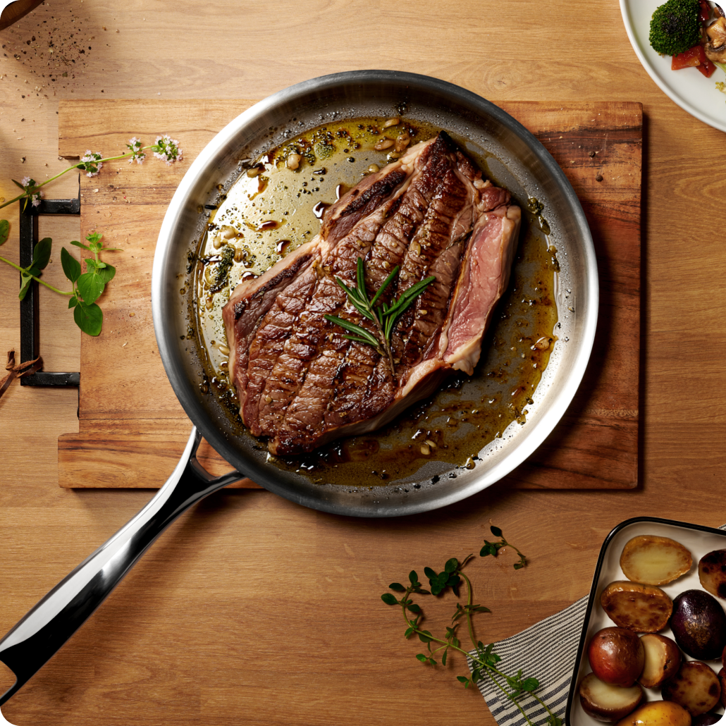 Steak searing in a Legend 5-ply stainless steel fry pan